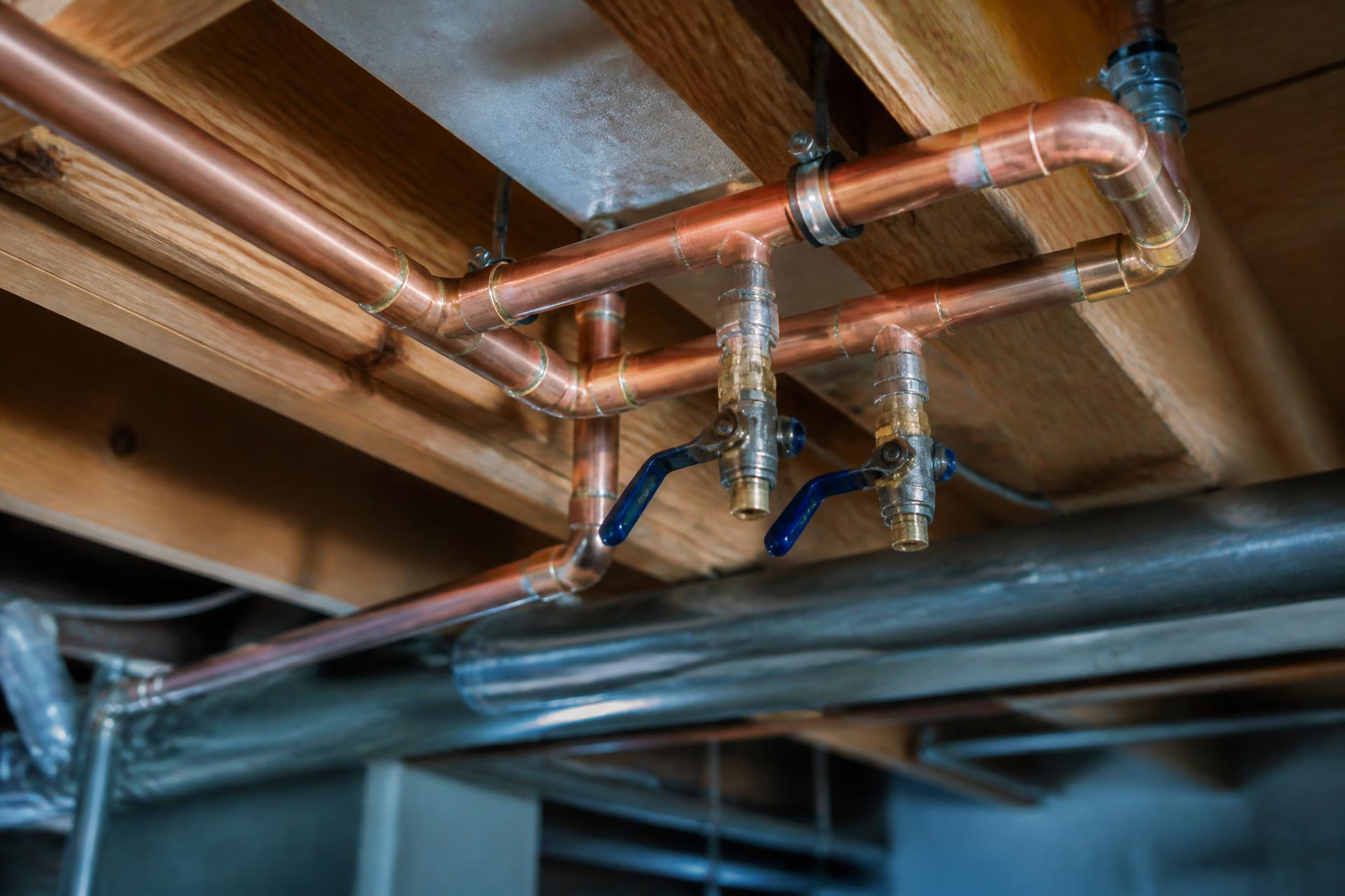Freshly soldered copper water lines